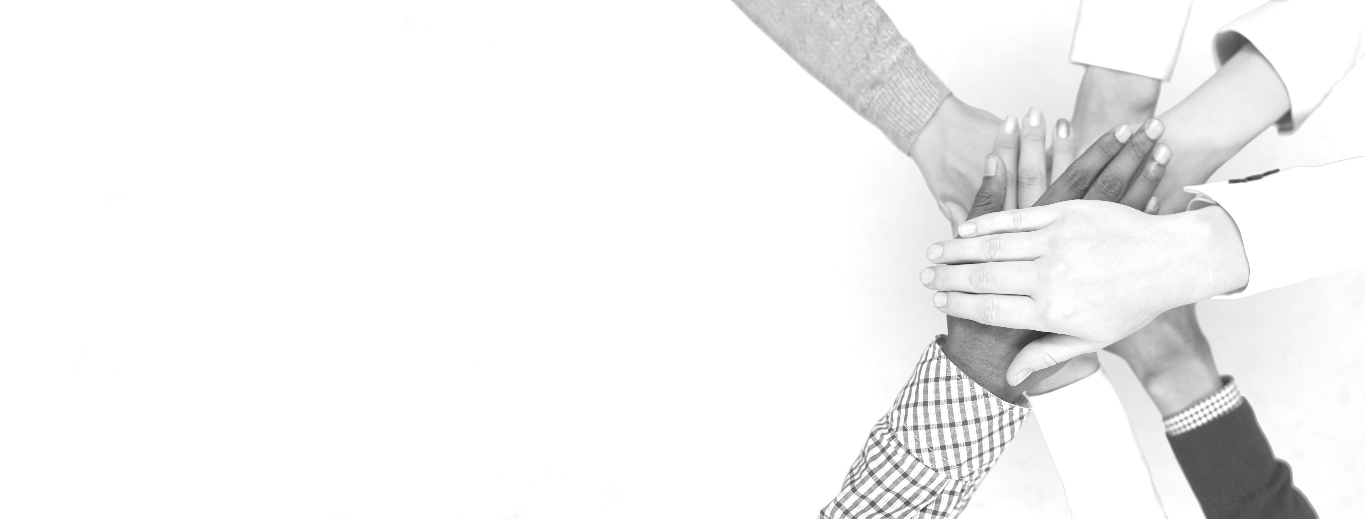 Diverse Business Team Putting Hands Together